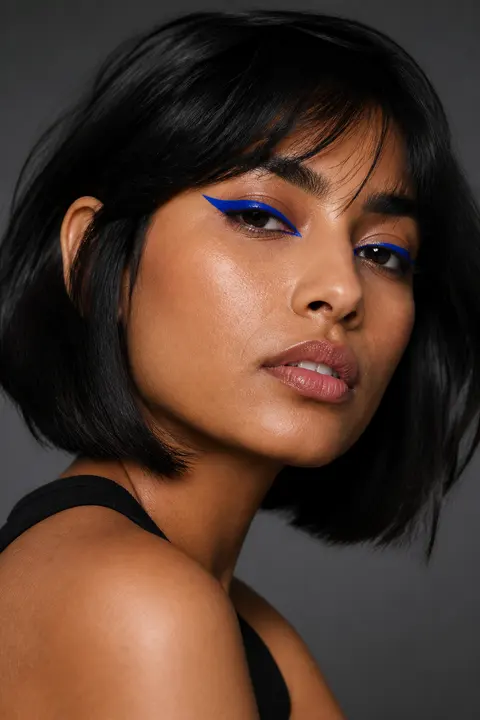 Graphic Cobalt Eyeliner: Olive Skin and Dark Bob