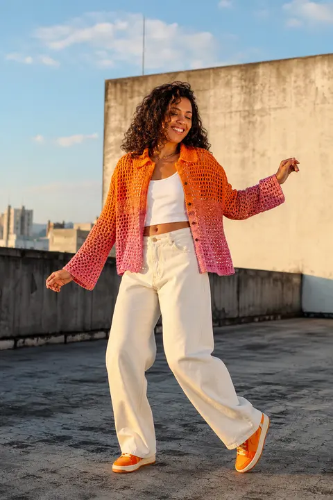 Orange Crochet Cardigan with Wide Cream Jeans