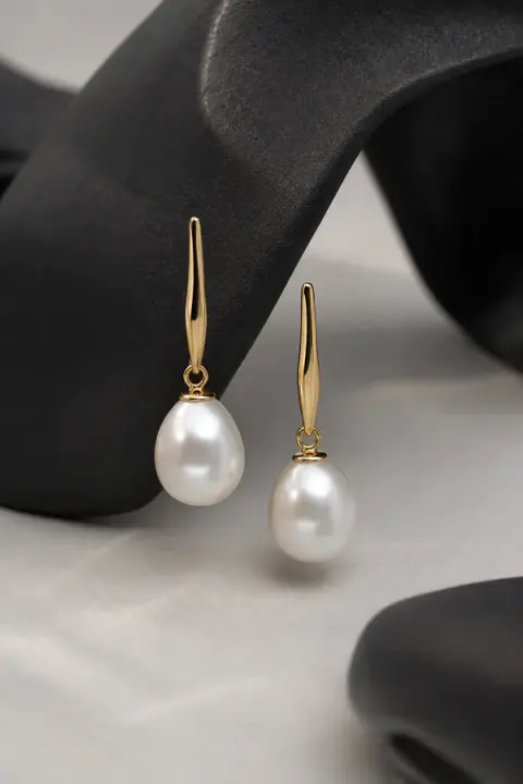 Pearl Drops Against Black Sculpture