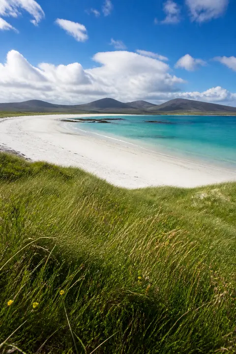 White Sand Lagoon Beneath Green Hills