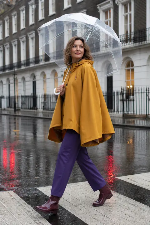 Mustard Rain Cape with Violet Trousers