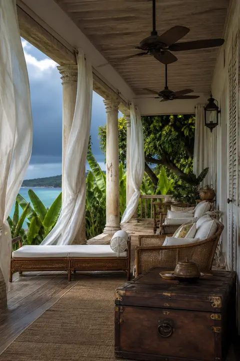 Tropical Veranda with White Draped Curtains