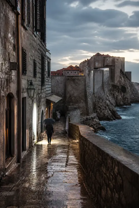 Rainy-Day View of Dubrovnik Stone Lane by Sea