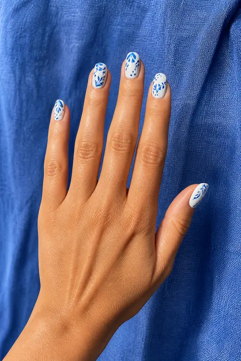 Cobalt Ceramic Pattern on White Nails