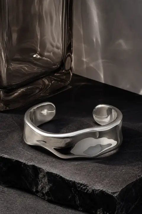 Sculptural Silver Cuff Still Life
