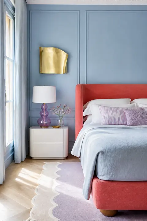 Pastel Bedroom with Coral Upholstered Bed