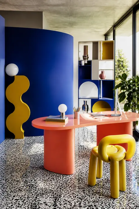 Memphis Studio with Cobalt and Coral Shapes