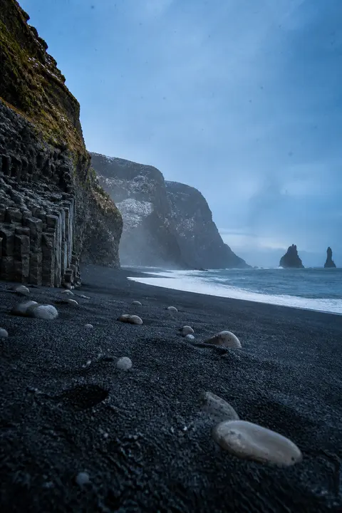 Moody Black Sand Beach and Sea Stacks