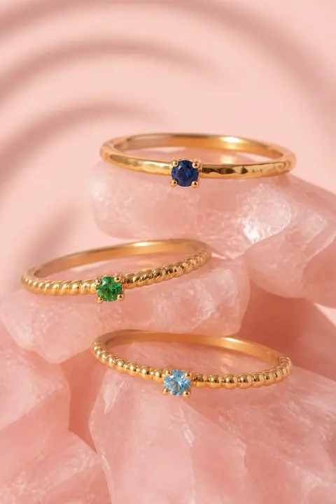 Color Gem Rings on Rose Quartz