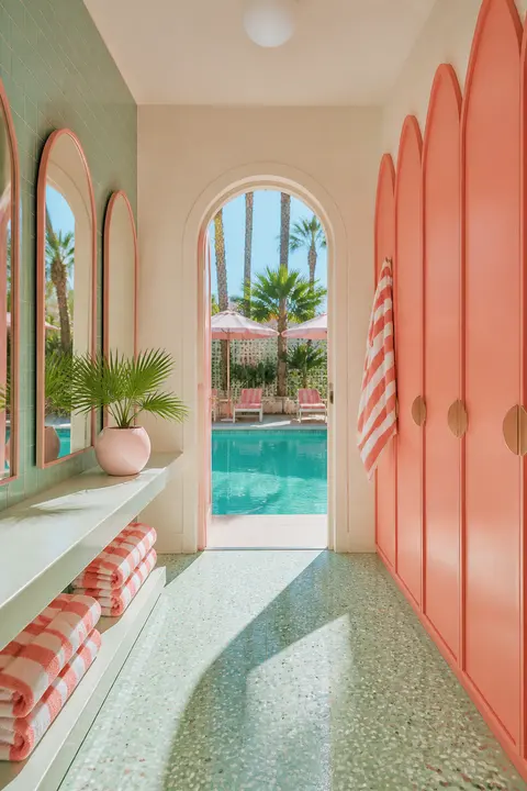 Pastel Pool Cabana with Coral Arched Doors